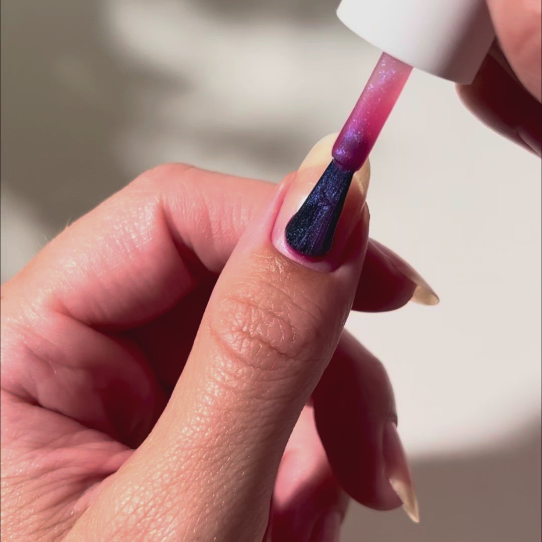 Painting Beloved on nails